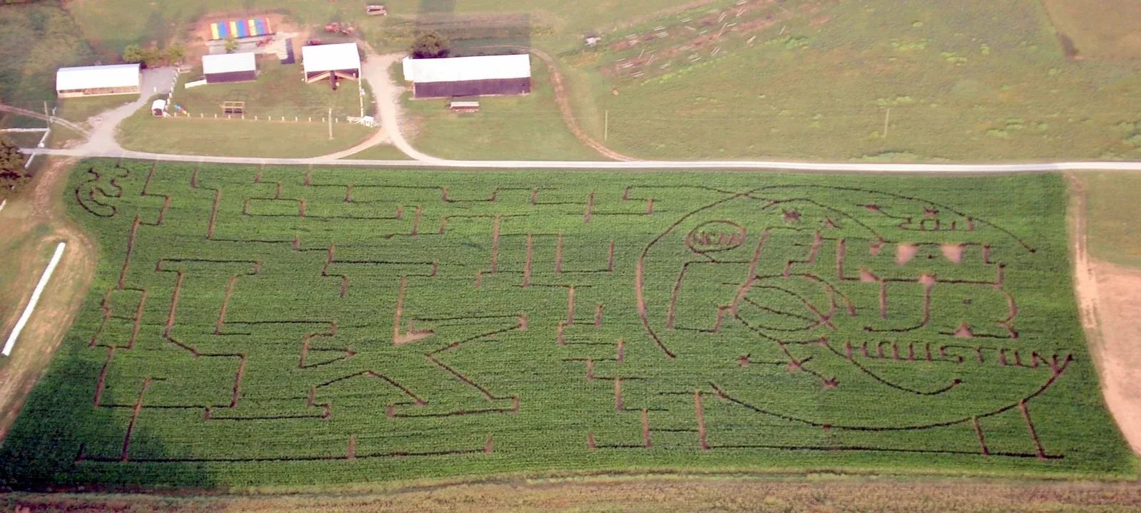 An aerial photograph of winding corn maze paths at Devine’s Corn Maze