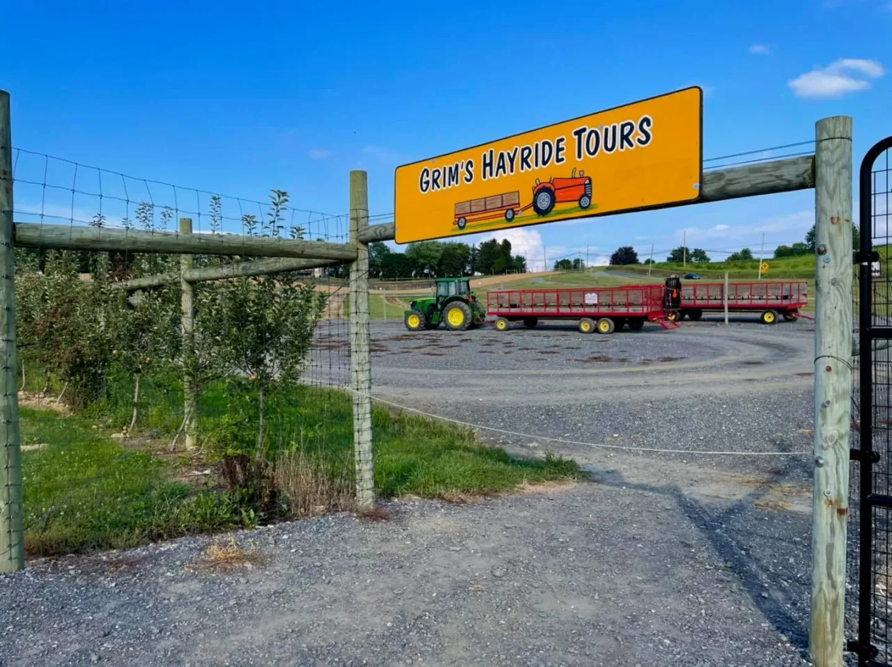 A hay wagon at the entrance to Grim’s Orchard & Family Farms