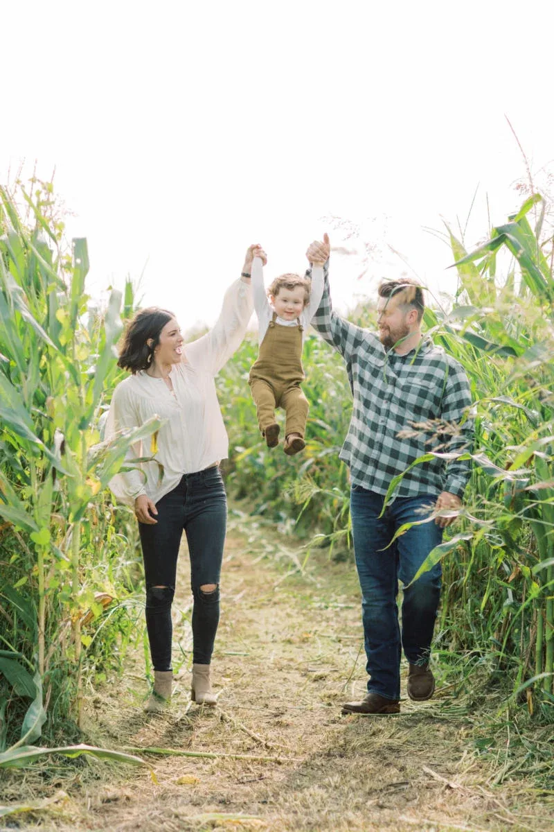 A family walking a corn maze path at Hinton’s Orchard