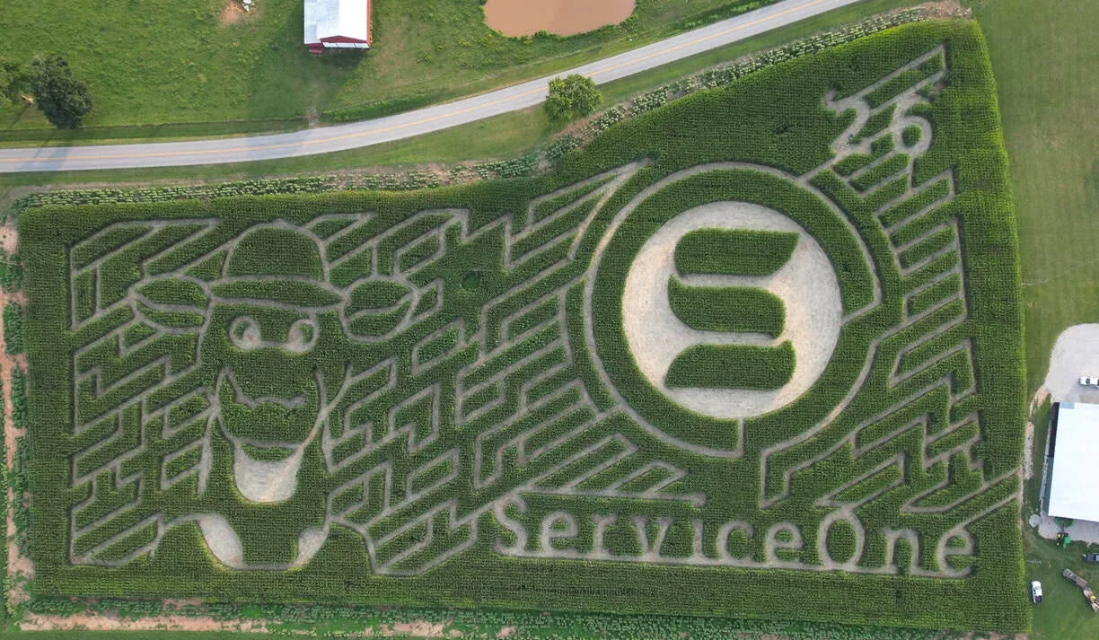 An aerial photograph of Just Piddlin Farm’s 2026 Service One corn maze