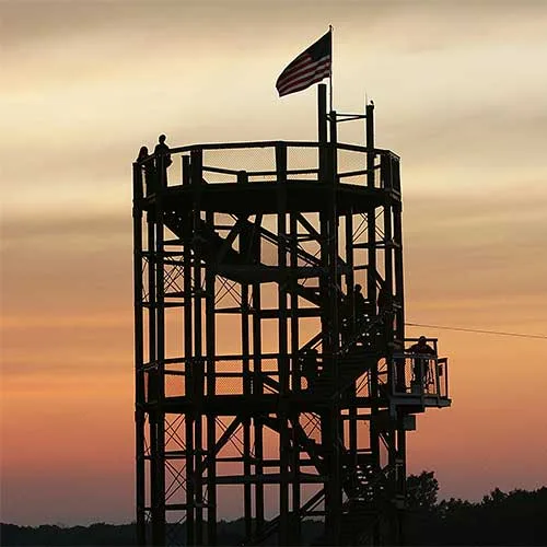 Richardson’s observation tower silhouetted against an orange evening sky