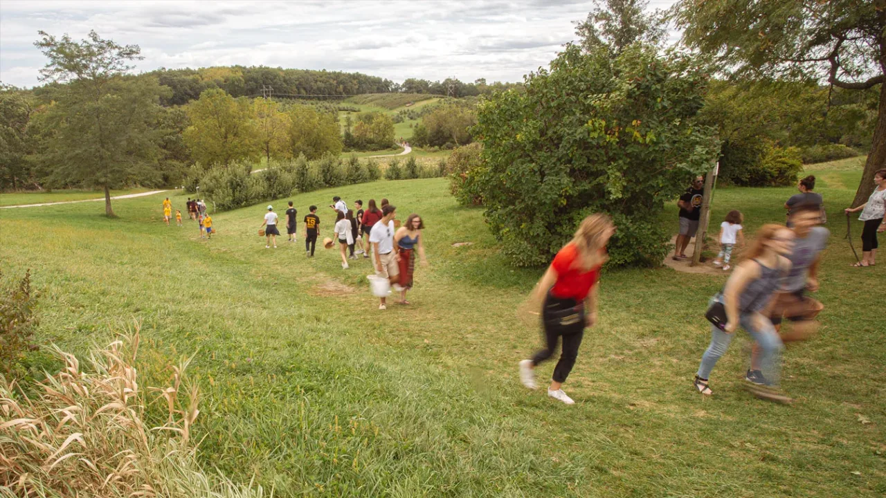 Children walking through the grounds of Wilson’s Orchard in Iowa City